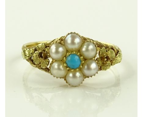 A Victorian unmarked gold turquoise and pearl set mourning ring, with engraved floral shoulders and hair back panel, setting 