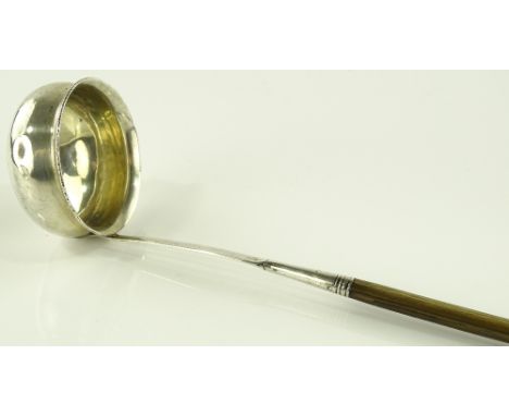 An Antique silver toddy ladle with whalebone handle, Newcastle hallmarks.
