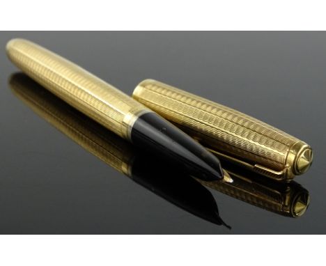 A Vintage Parker 9ct gold engine turned fountain pen.
