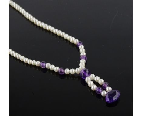 A cultured pearl and amethyst necklace with 9 ct gold clasp.