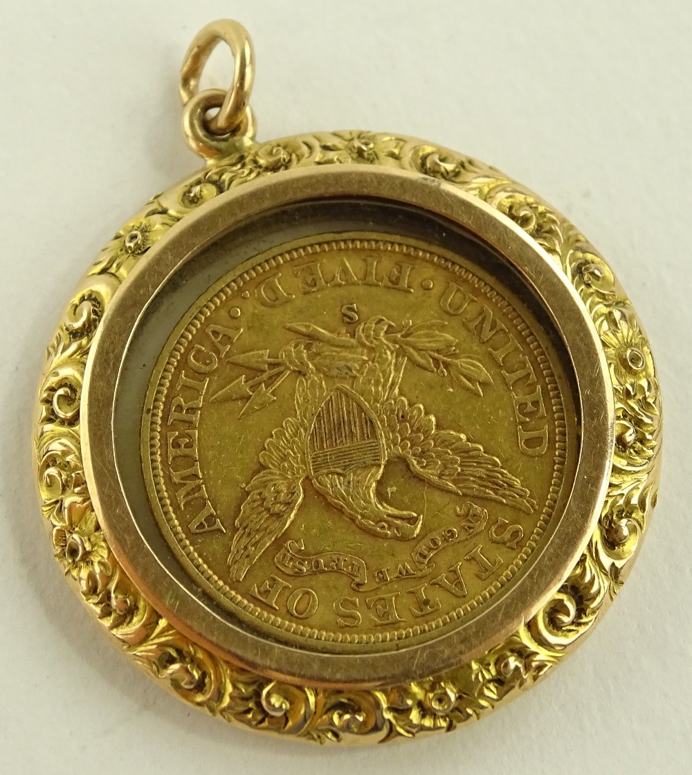 An American 1906 gold 5 dollar coin, in unmarked chased gold pendant ...