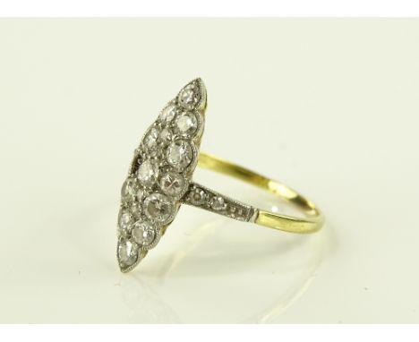 An 18ct gold diamond set lozenge panel ring, panel height 19mm, 1 stone separate.