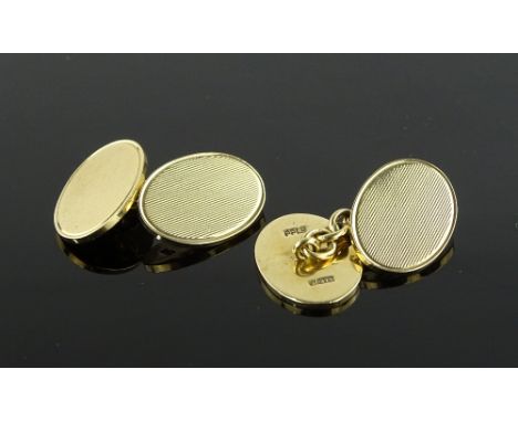 A pair of 9ct gold engine turned cufflinks, 12g.