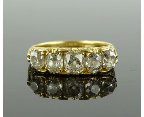 A large 18ct 5 stone old-cut diamond ring, circa 1900, carved settings, total diamond content approx. 2cts, setting width 21m