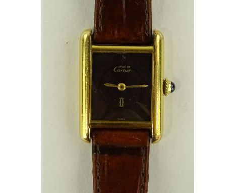 A lady's Must De Cartier wristwatch, silver case with sapphire crown, case no. 3008855, case width 20mm, working order.