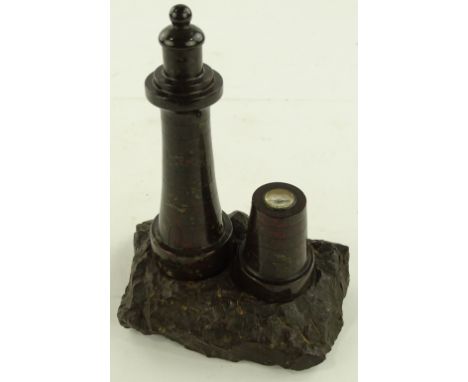 A Cornish serpentine marble ornamental lighthouse with inset compass, height 19cm.