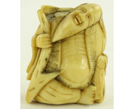 A 19th century Chinese bone netsuke, height 3.5cm.