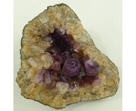 A natural amethyst rock geode, height 25cm.