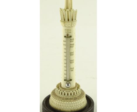 A Victorian carved and pierced ivory turret design desk thermometer by Hobdell of Oxford, turned wood base, overall height 19