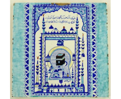 A large Islamic painted pottery tile, width 30cm.