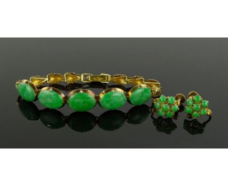 A 9ct gold and jade set panel bracelet, together with a pair of jade cluster earrings, (3).