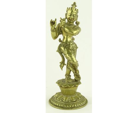 An Antique Oriental bronze dancing deity, height 25cm.