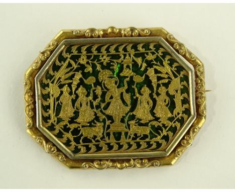 A large ornate 19th century Indian unmarked gilt metal brooch with foil backed gilt metal panel depicting dancing figures, wi