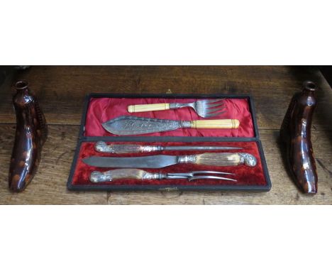 CASED CARVING SET, PLATED FISH SERVERS AND PAIR OF CERAMIC BOOT WARMERS 