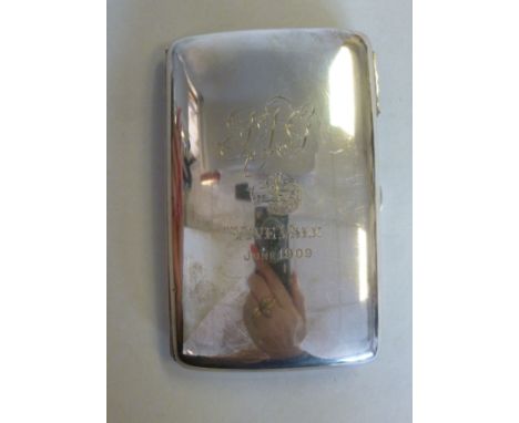 An Edwardian silver curved, cushion moulded, folding cigar case, on a button clasp  Adkin Bros  Birmingham 1908