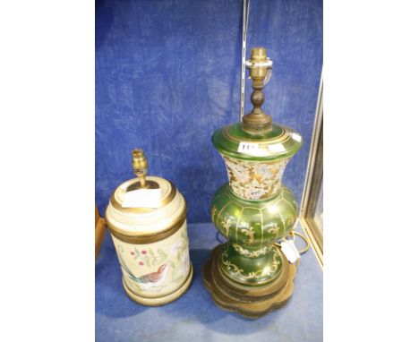 A modern lamp base, cylindrical, decorated with exotic bird, 37cm high and a green glass lamp base, urn shaped, gilt decorati