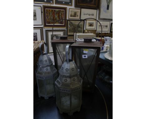 Two pairs of metal lanterns, together with a F & M picnic hamper basket Best Bid