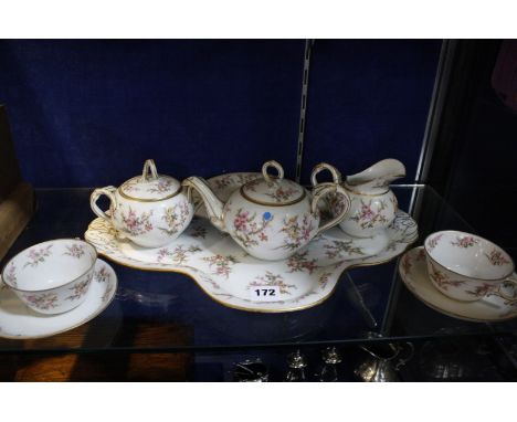 A porcelain tête-à-tête tea service, floral painted Best Bid