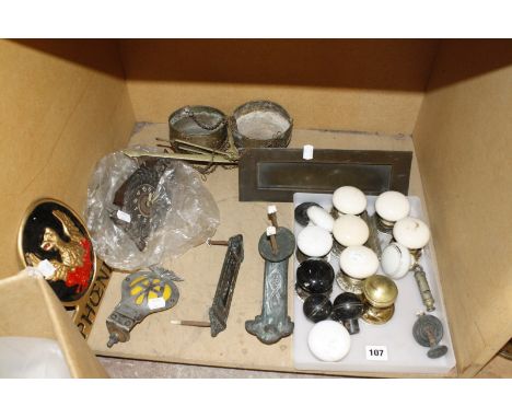 A quantity of vintage ceramic door knobs, with other decorative items of door furniture, together assorted metal items