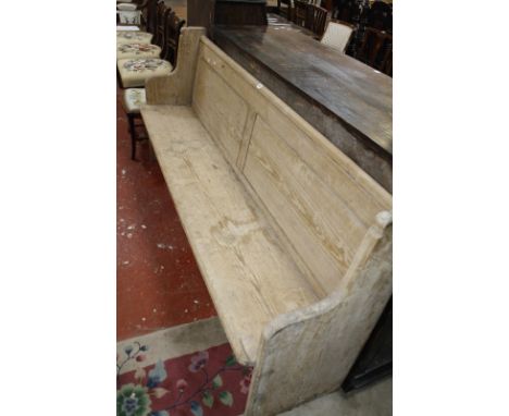 A pine pew/hall bench. 190cm long.