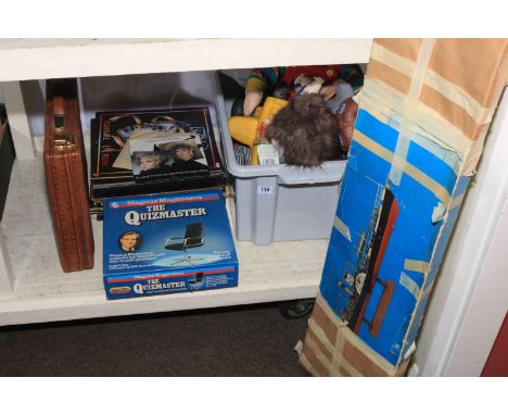 LP records, The Quizmast game, model boat kit, soft toys and leather briefcase.