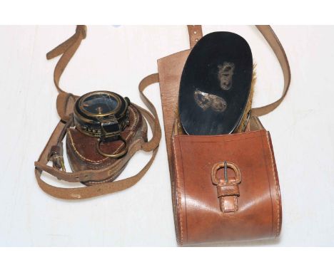 WWI military compass in leather case, and pair gents hair brushes.