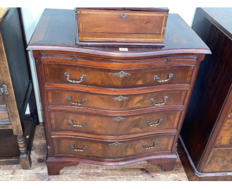 Mahogany serpentine front chest having brush slide above four long drawers on bracket feet, 76cm by 70cm by 48cm.