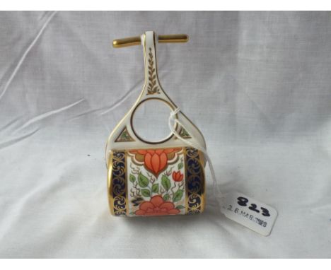A miniature garden roller – 5” high      
