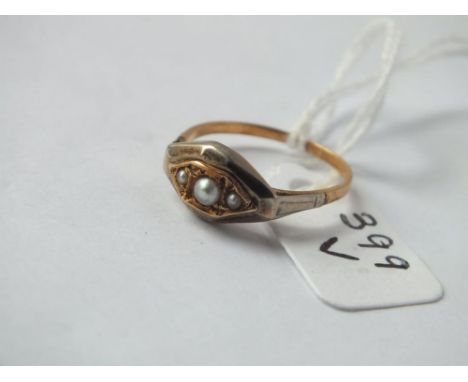 Three stone pearl ring set in gold – size M     