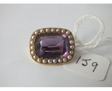 Attractive amethyst and pearl set brooch set in gold    