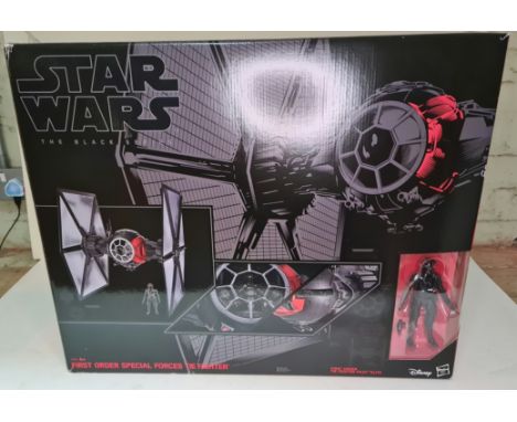 A collection of Star Wars toys, all boxed, to include a first order special forces tie fighter, a Princess Leia ceremonial go