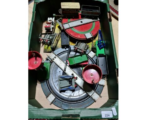 A box of Hornby 0 gauge model railway accessories. 