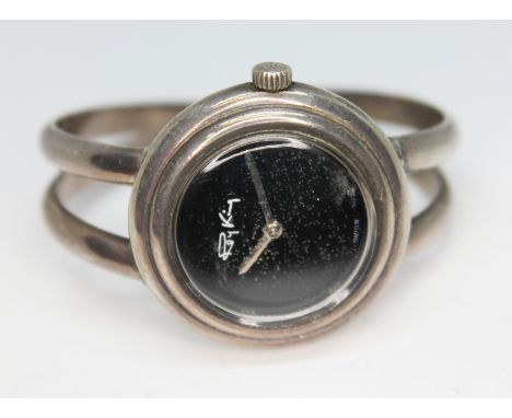 A Roy King hallmarked silver bangle watch. 