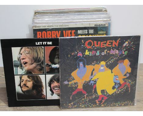 A box of LPs, mainly 1960 to 1980s, approx. 45, Beatles, Hollies, Rolling Stones etc.