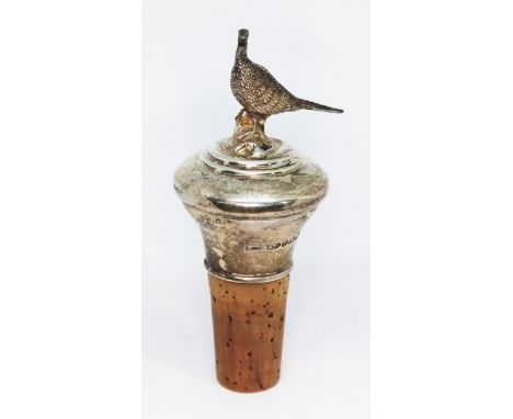 A novelty hallmarked silver bottle stopper with pheasant finial, length 9cm.Condition- good, some very slight knocks around t