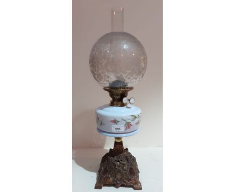 An early 20th century Duplex oil lamp on cast metal base, height 58cm.  