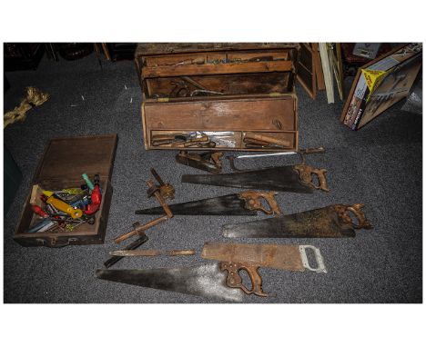 Collection Of Carpenters Tools Including old saws, two cases and assorted tools.