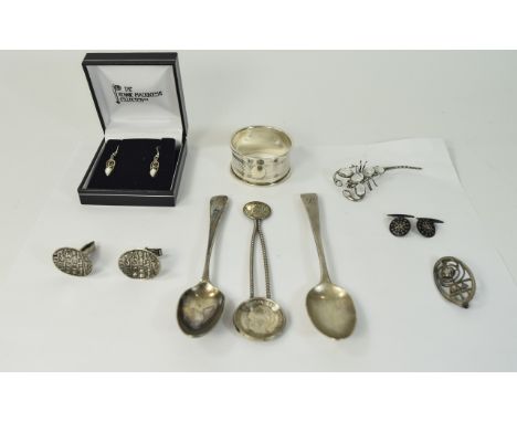 Mixed Lot Comprising Silver Spoons , Napkin Ring etc contains Dutch spoon, silver brooch, brooch and earrings.