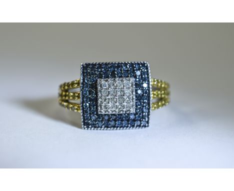 9ct White Gold Diamond Dress Ring set with central cluster of 16 Round Cut diamonds surrounded by 2 Rows Of fancy blue colour