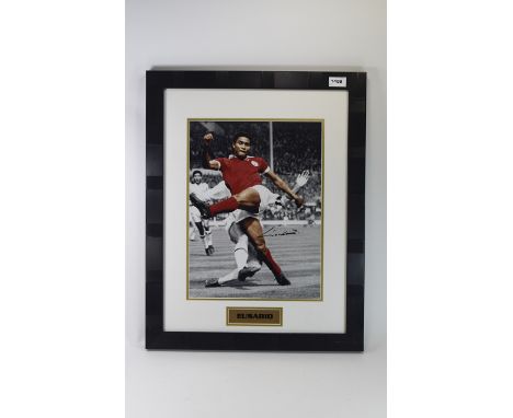 Football Interest. Signed photo of Eusabio, Portugal complete with 'True Colours' Certificate of Authenticity. Black frame & 