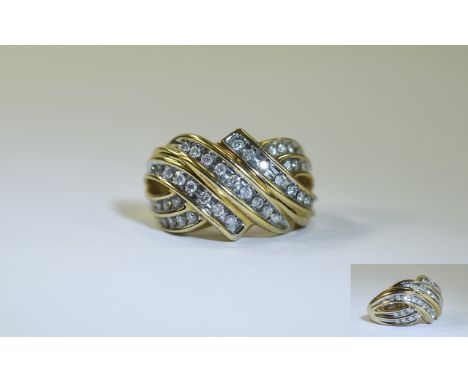 9ct Gold Diamond Cluster Ring. Channel set round brilliant cut diamonds. Unmarked test 9ct, ring size N. Estimated diamond we