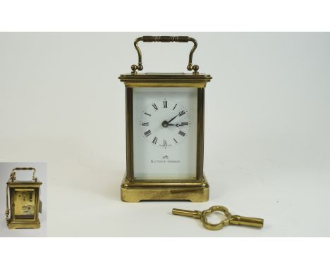Matthew Norman - Top Quality and Heavy Brass Carriage Clock, Features White Porcelain Dial, Black Numerals, Visible Escapemen