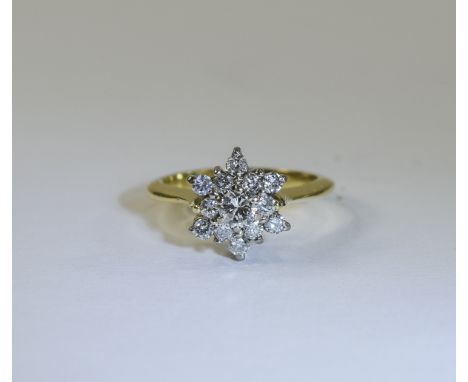 18ct Gold Diamond Cluster Ring. Fully Hallmarked. Est Diamond Weight 25 pts. Diamonds Nice and Bright. Small Ring Size. 