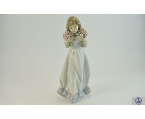 Lladro Collectors Society Members Figure for 1989 ' Spring Bouquets ' Girl Holding Flowers. Model No 7603. Sculptured by Juan