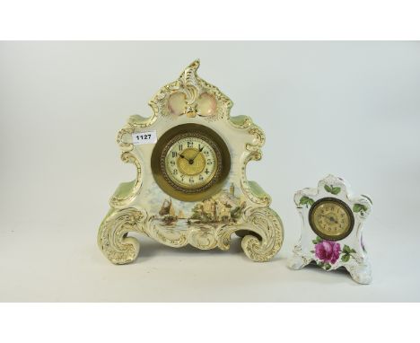 Decorative Mantle Clock. Porcelain clock, the surround decorated with coastal scene. Classic design dial with heavily gilded 
