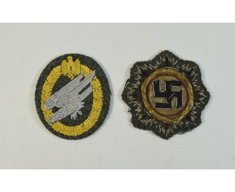 Nazi WWII Waffen SS Panzer Cloth German Cross in Gold Together With A German Army Paratrooper Cloth Badge