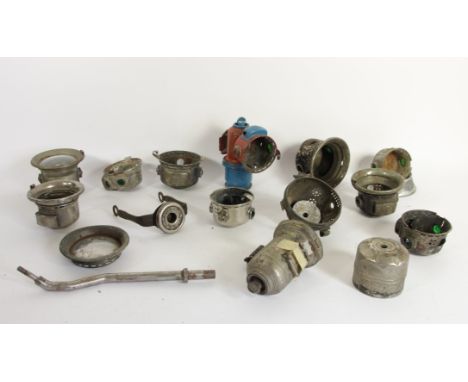 A collection of acetylene lamp and carbide holder spares