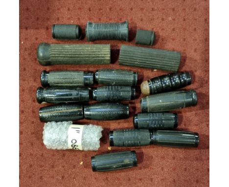 A collection of vintage handlebar grips and foot rubbers 