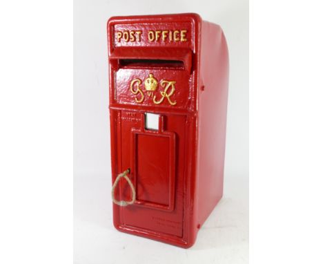 A G6R lamp style post box, c.1936 - 1952, with King George VI cypher, made by Carrow Company, Stirling, red with gilt decorat