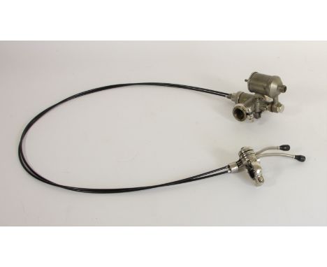 A vintage AMAC Ltd carburettor, stamped 30 PUY, B3944, with twin levers and control cables